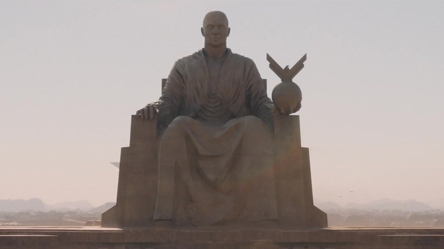 Patung raksasa Paul Atreides duduk di singgasana di tengah gurun dalam trailer final Dune: Part Three
