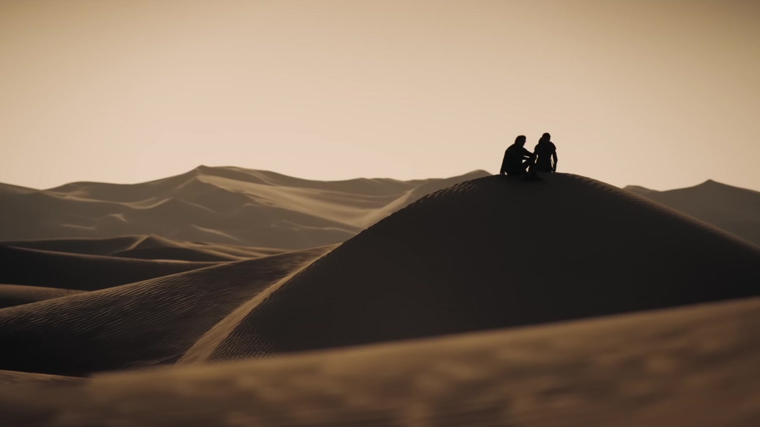 Dune Tentang Apa? Panduan Pemula Minim Spoiler 5 Paul dan Chani di gurun Arrakis dalam Dune Part Two